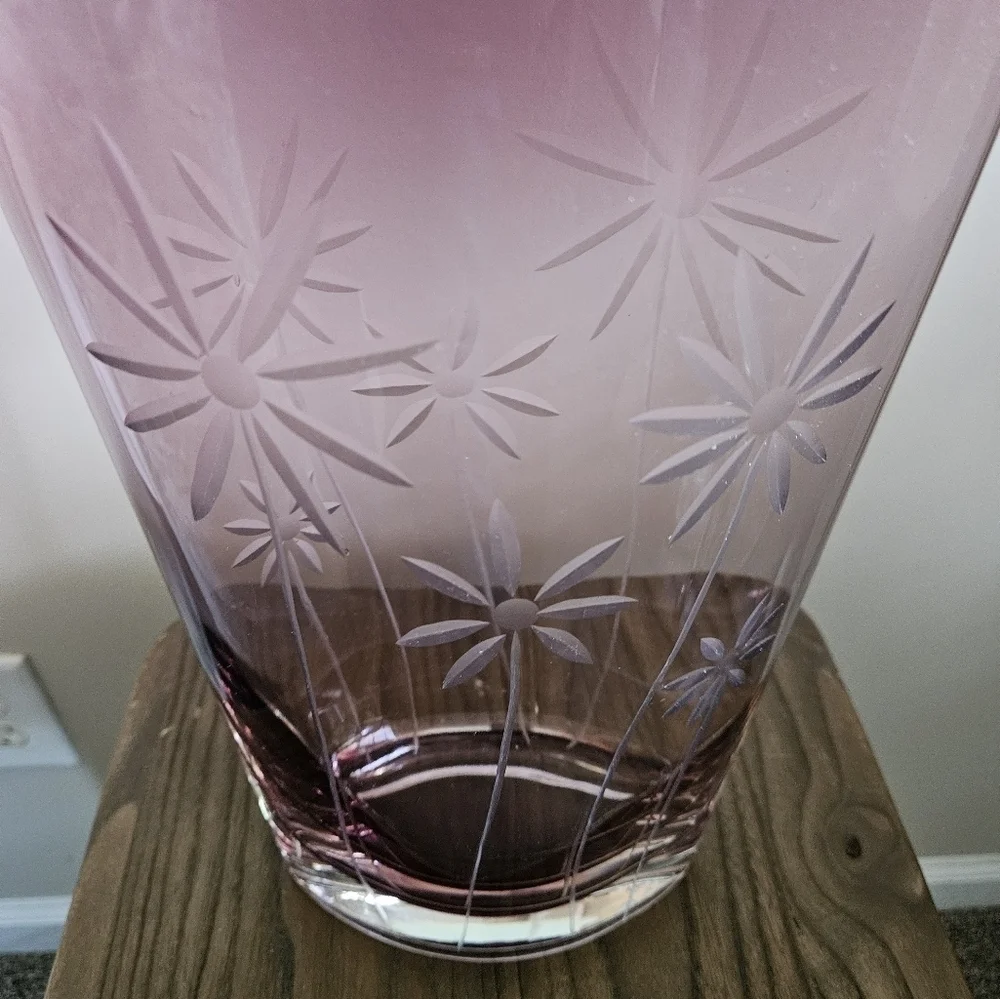Elegant oval clear cut purple vase.